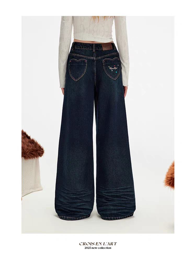 Синие джинсы с вышивкой и рюшами детальное фото 14