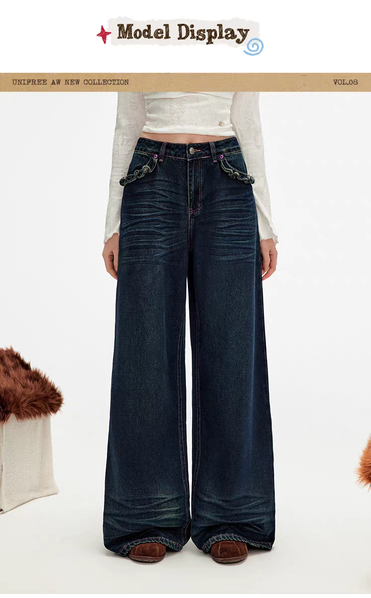 Синие джинсы с вышивкой и рюшами детальное фото 8