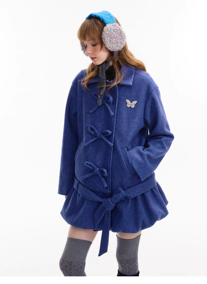 Пальто с бантом и асимметричным подолом детальное фото 16