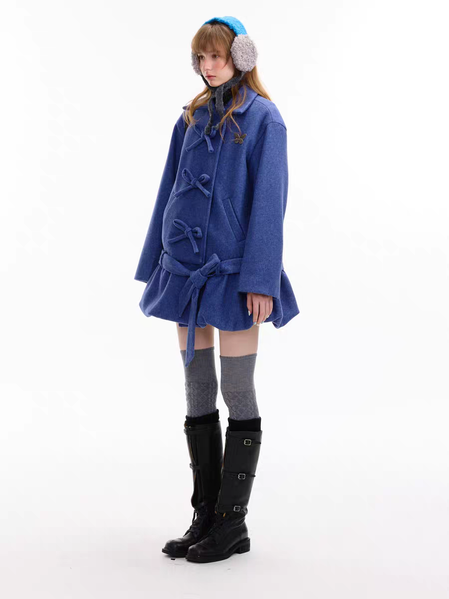 Пальто с бантом и асимметричным подолом детальное фото 23