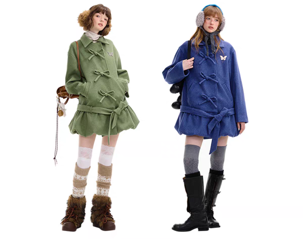 Пальто с бантом и асимметричным подолом детальное фото 3