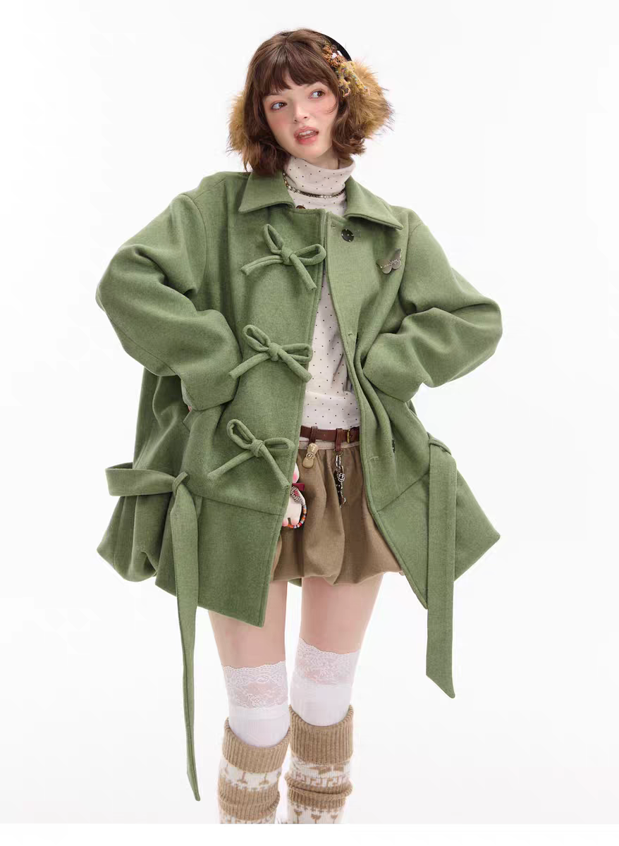 Пальто с бантом и асимметричным подолом детальное фото 9